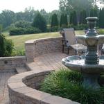 EP Henry patio and walkway installations to help you expand your outdoor living space.  Fountain creates a tranquil setting for this outdoor space.