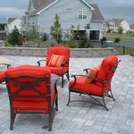 Patio and seat wall extended the usable space around the pool.