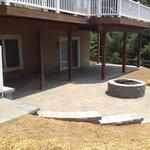 Cambridge paver patio in Avondale with retaining wall and steps helps extend outdoor living space.