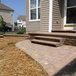 Cambridge Stoop, Steps and Landing replaced old worn concrete and help to accent this house's curb appeal